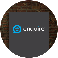 Enquire logo on a brick background